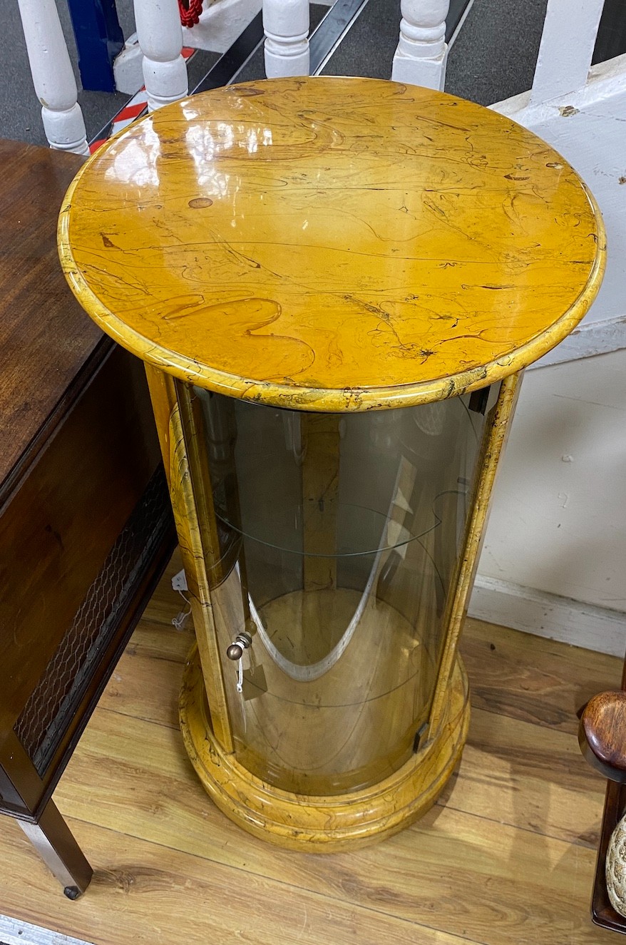 A pair of faux marble glazed cylindrical display cabinets, height 88cm, diameter 42cm